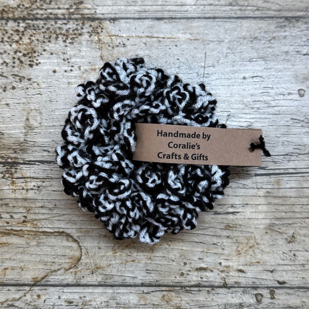 This black and white scrunchie when sold is presented with Kraft band to say that is was handmade at Coralie's Crafts & Gifts