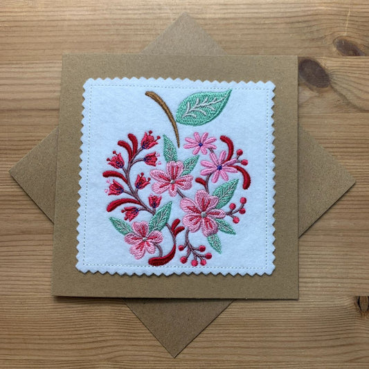 This beautiful floral design in the shape of an apple is a perfect gift for any teachers, family or friends. Not only is this a wonderful embroidered card, but it is a lovely keepsake item that can be framed afterwards