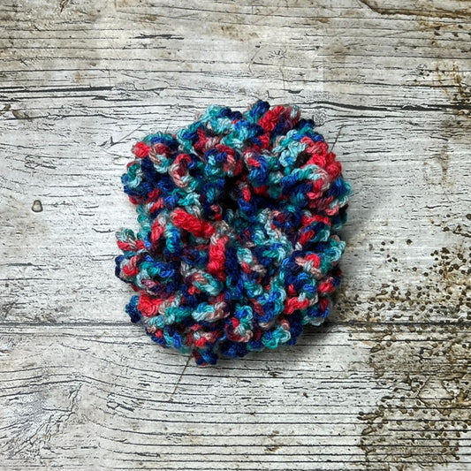 This gorgeous Jitterbug yarn in the Go-Go colourway is lovely and bright with lots of blues and reds in it. Perfect for brightening up any hairstyle.