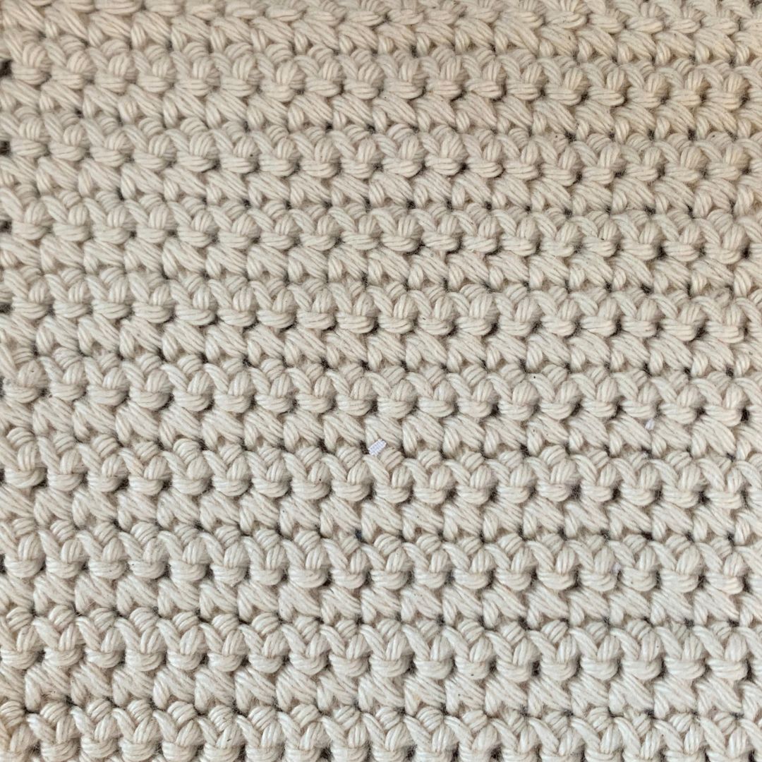 This picture is a of a double crochet dishcloth, and we learn how to do double crochet in Level 1 beginners crochet workshop.