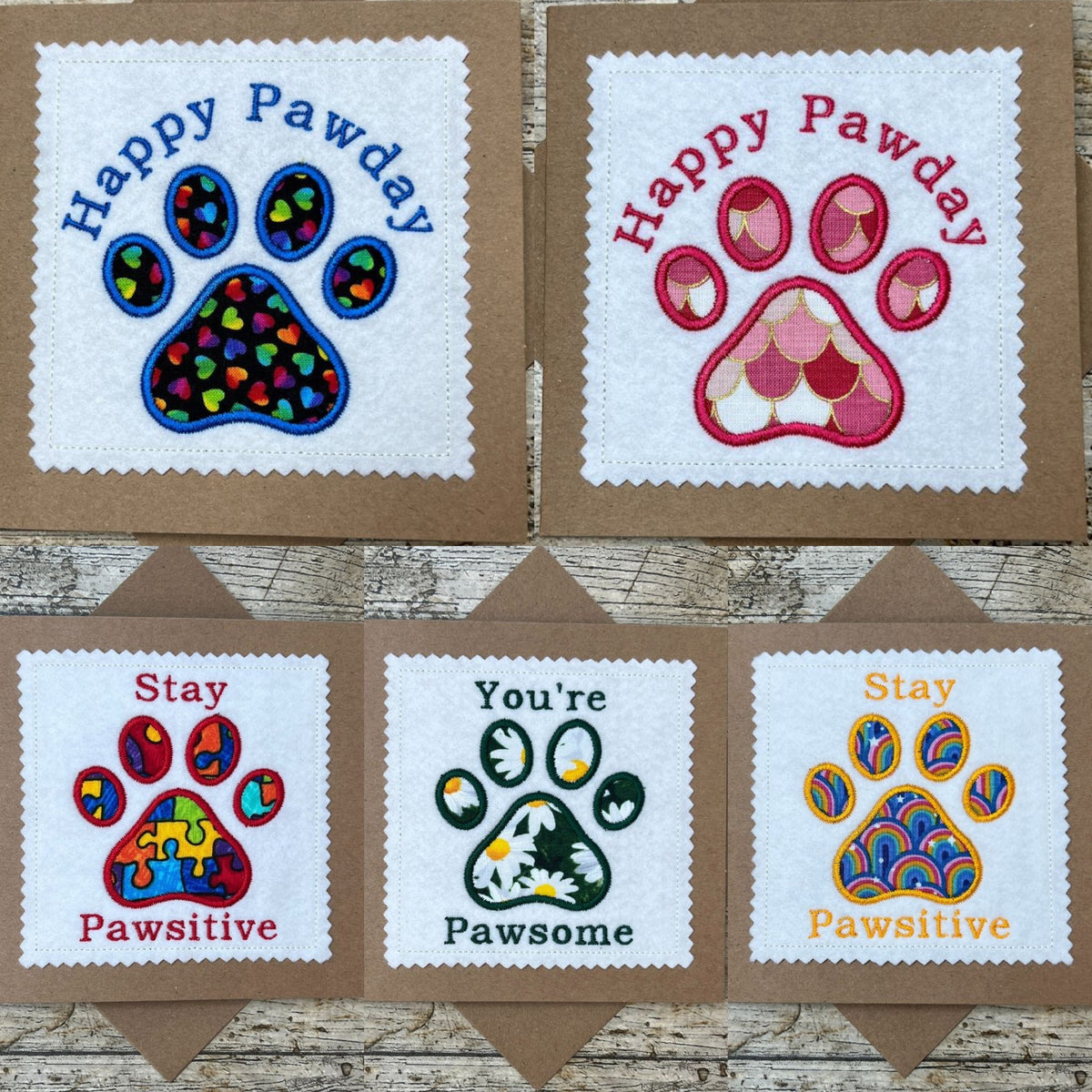 Paw themed cards with the words - happy Pawday, stay Pawsitive, you’re pawsome 
