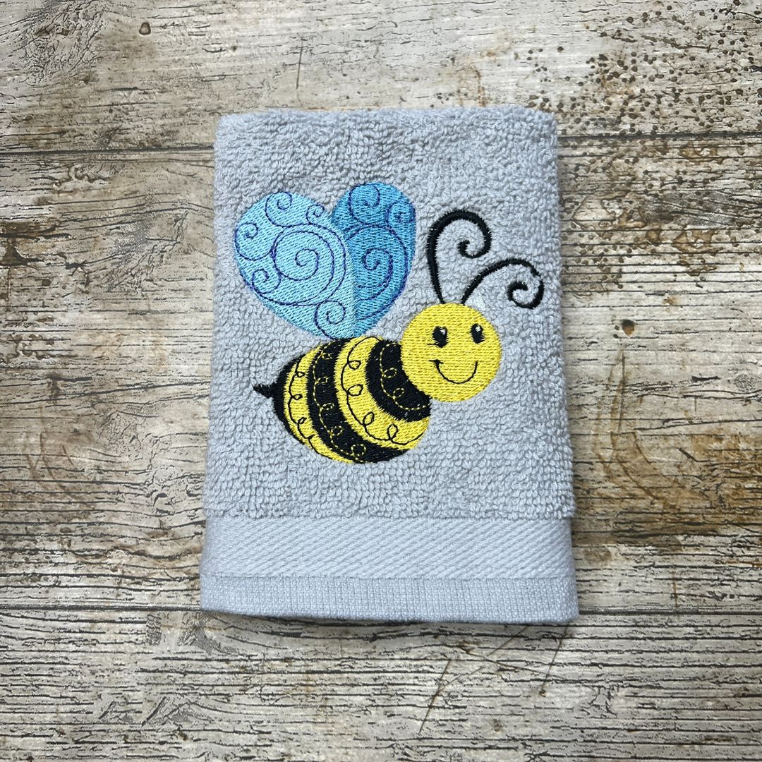 great bumble bee design embroidered onto face cloths to order at Coralie's Crafts & Gifts in Dorset