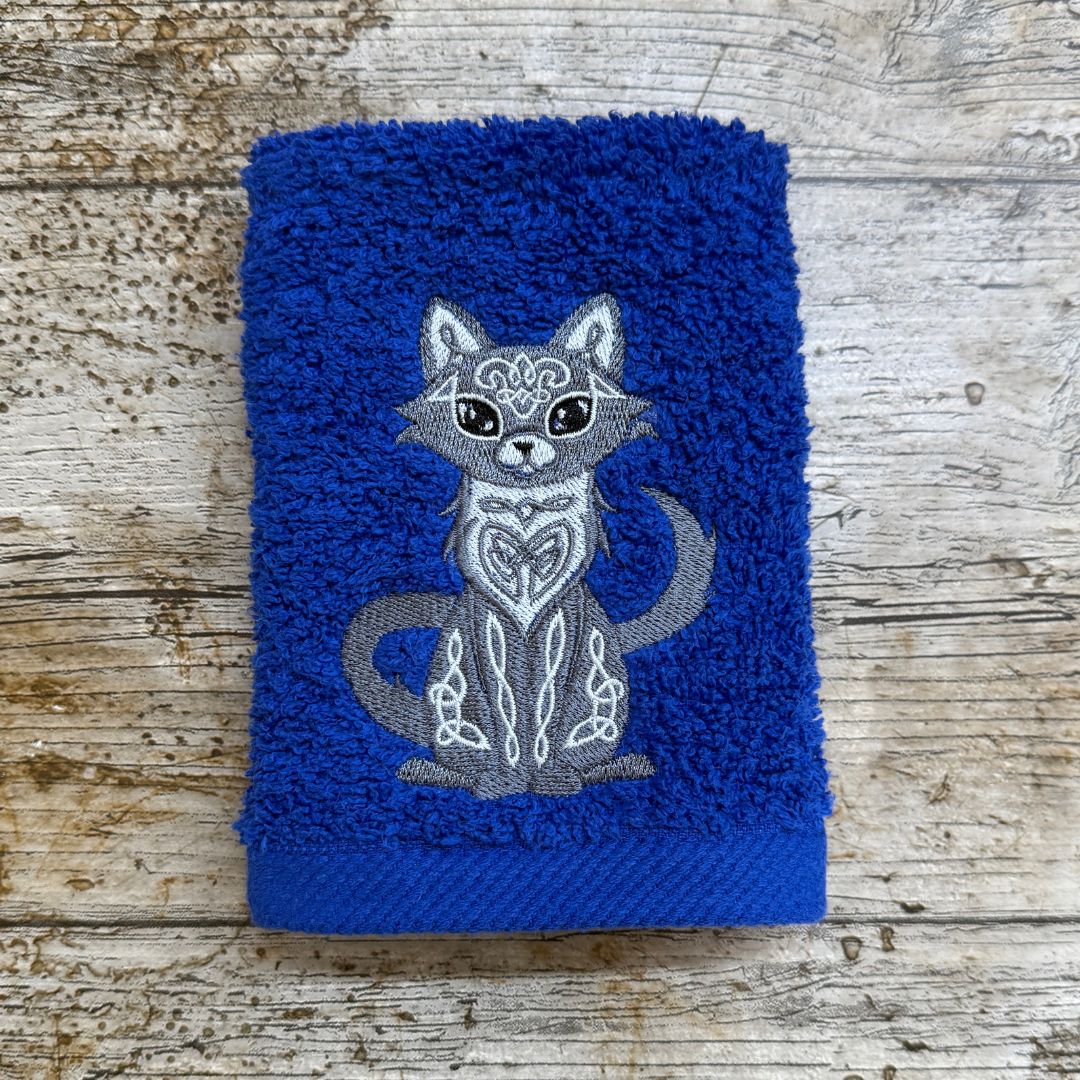 this fabulous Celtic cat design is beautifully stitched onto a Blue super soft face cloth, embroidered by Coralie's Crafts & Gifts. 