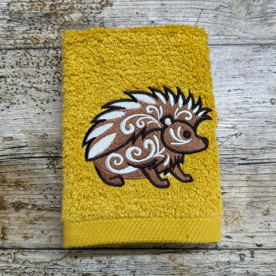 A beautiful celtic hedgehog design, the perfect gift for any hedgehog lover, this design is embroidered onto super soft face cloths, by Coralie's Crafts & Gifts in Dorset.