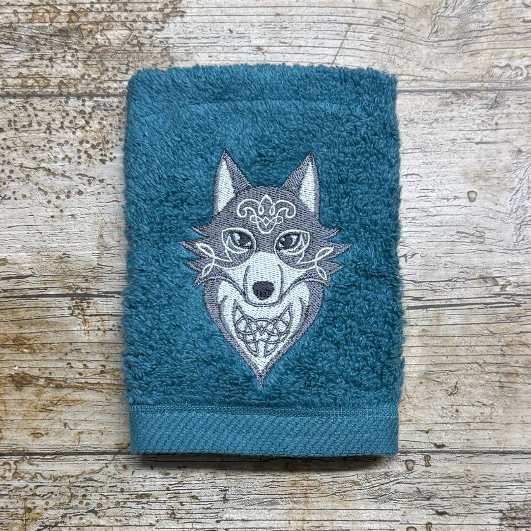A beautiful Celtic Wolf design is embroidered onto super soft face cloths to order at Coralie's Crafts & Gifts in Dorset and is a perfect gift for any wolf fan.