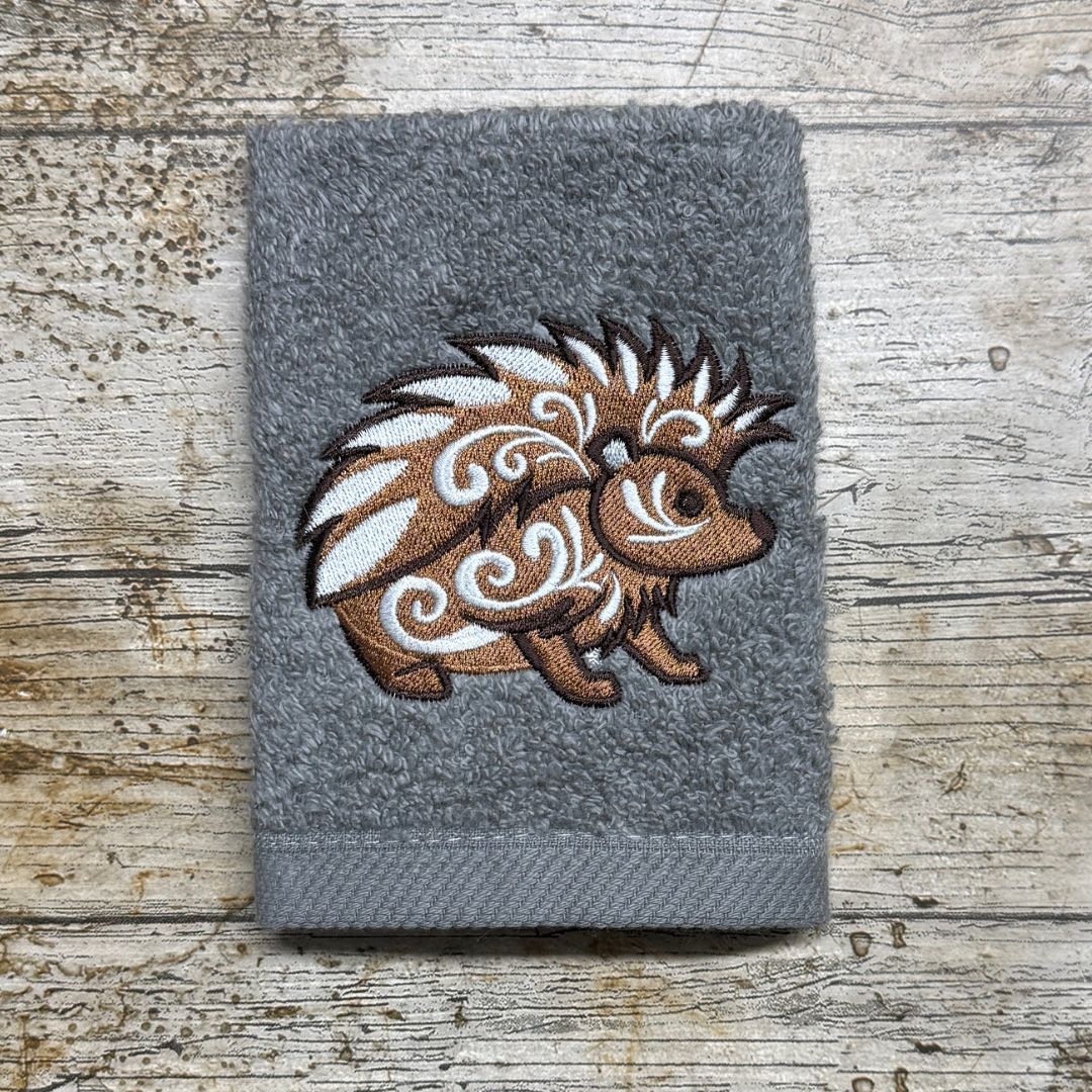 A beautiful celtic hedgehog design, the perfect gift for any hedgehog lover, this design is embroidered onto super soft face cloths, by Coralie's Crafts & Gifts in Dorset.