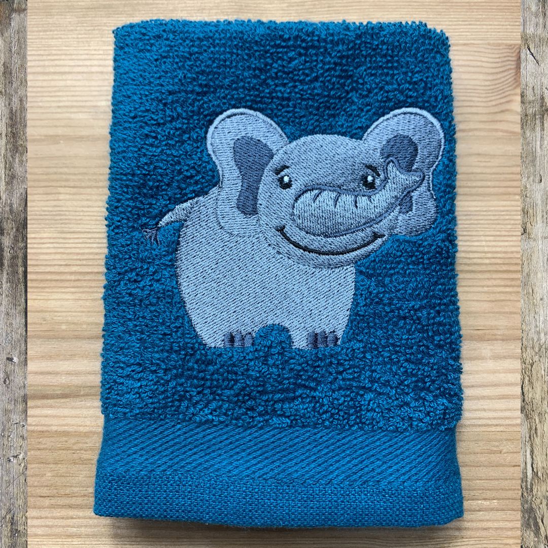 beautiful elephant design embroidered onto super soft face cloths by Coralie at Coralie's Crafts & Gifts