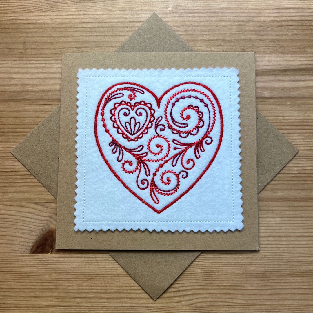 This beautiful red filigree heart design is embroidered onto felt, then put onto card, not just a card, but a keepsake item too.