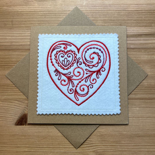 This beautiful red filigree heart design is embroidered onto felt, then put onto card, not just a card, but a keepsake item too.