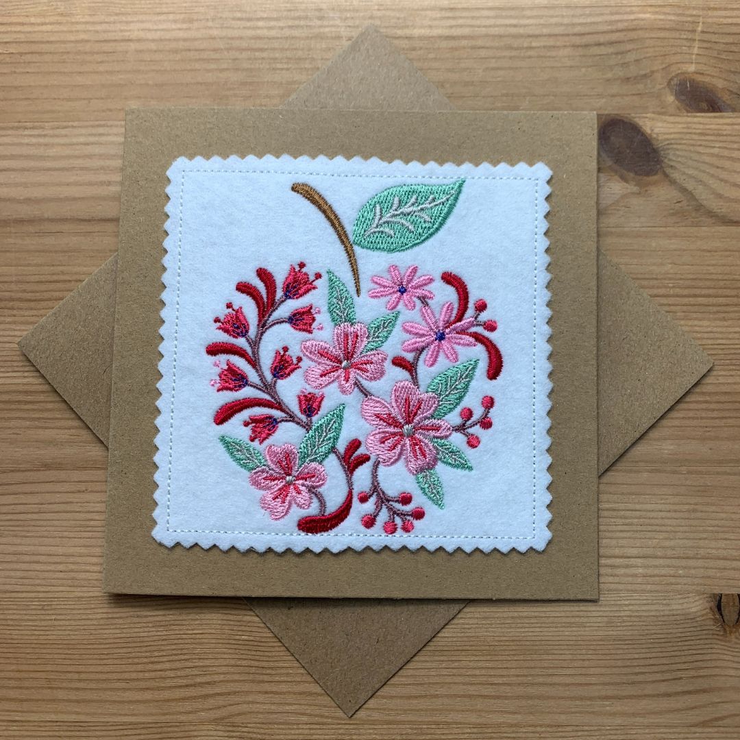 This beautiful floral design in the shape of an apple is a perfect gift for any teachers, family or friends. Not only is this a wonderful embroidered card, but it is a lovely keepsake item that can be framed afterwards