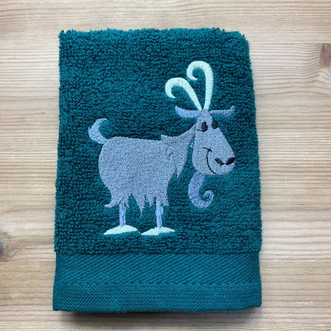 This lovely cheeky goat design is embroidered onto super soft face cloths by Coralie's Crafts & Gifts in Dorset.