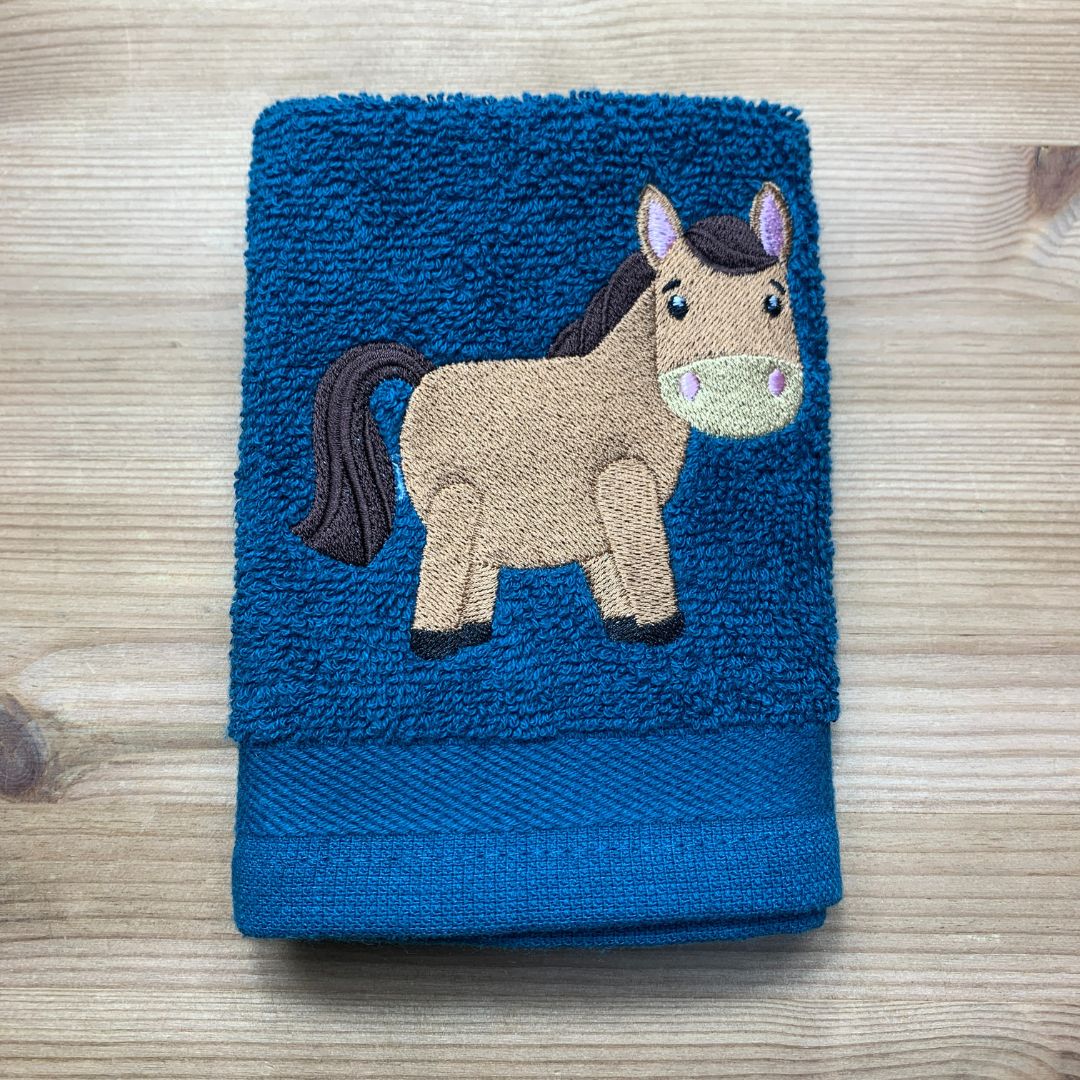 Lovely horse design is embroidered onto super soft Cotton face cloths at Coralie's Crafts & Gifts. 