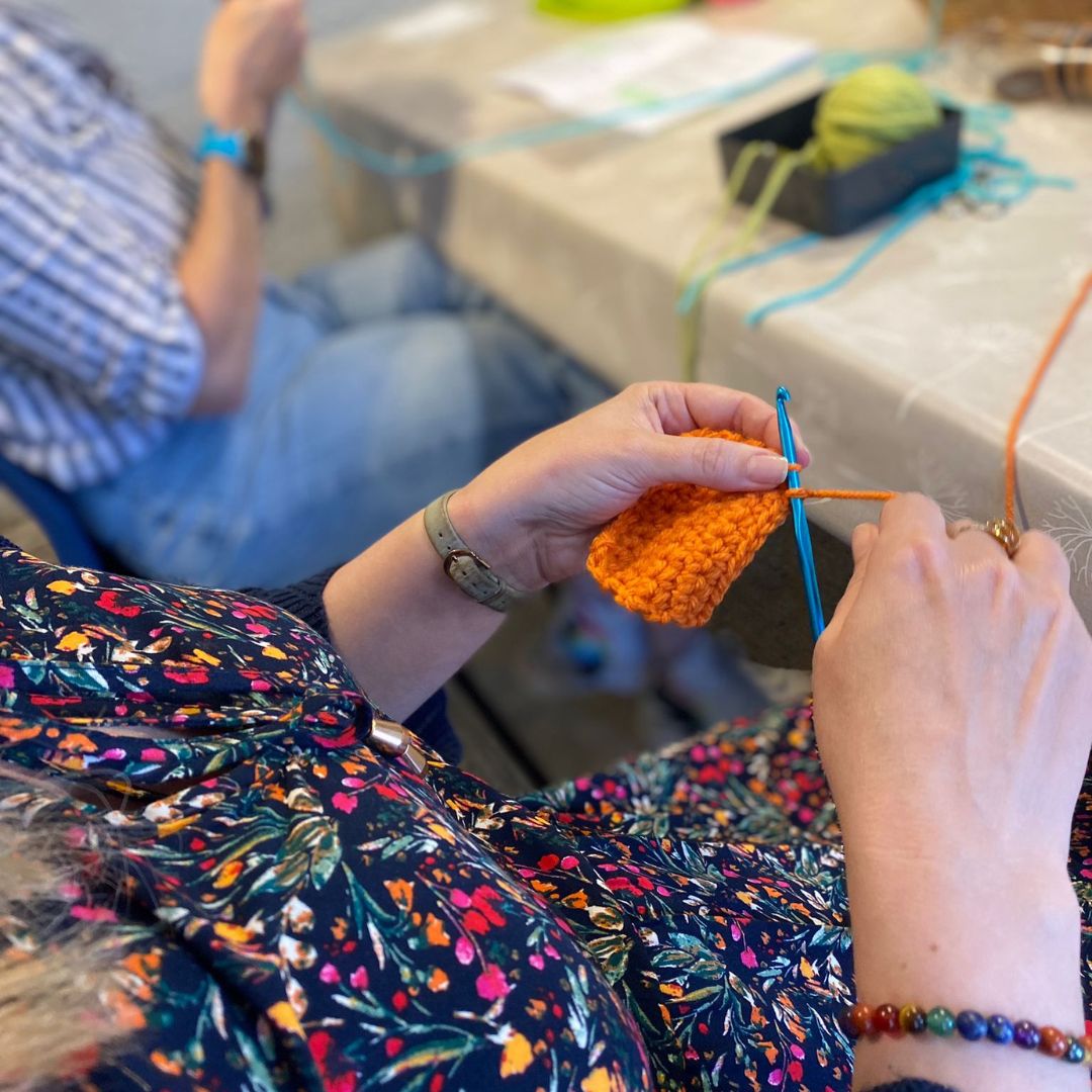A student in this photo is practising their double crochet stitches. 