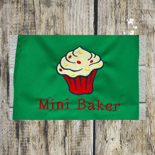 This wonderful green mini baker apron has a wonderful cupcake design on it, with added sprinkles and the wording Mini Baker on it