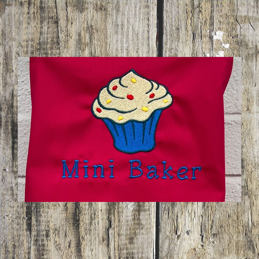 This wonderful red mini baker apron has a wonderful cupcake design on it, with added sprinkles and the wording Mini Baker on it
