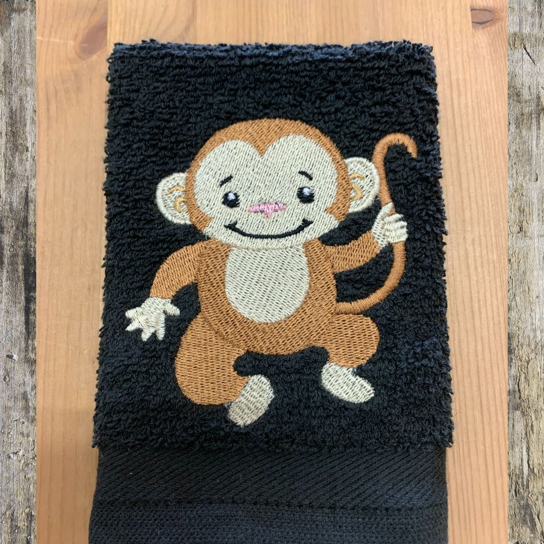 Beautiful Cheeky monkey design embroidered onto super soft cotton face cloths by Coralie's Crafts & Gifts in Dorset, UK