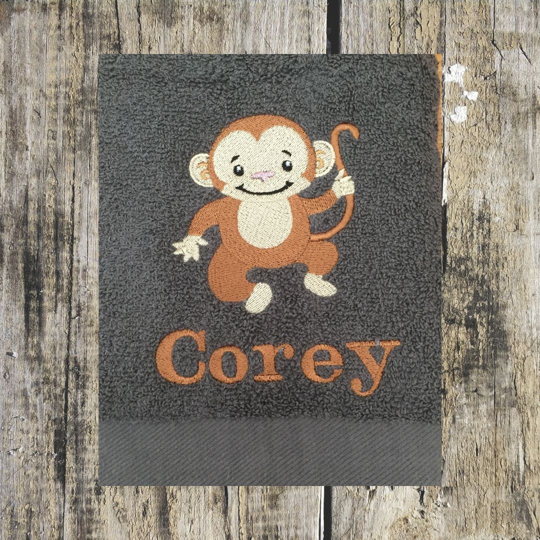 This cheeky monkey design personalised with a name can be embroidered onto hand towels, bath towels, bath sheets and hooded towels to order by Coralie at Coralie's Crafts & Gifts