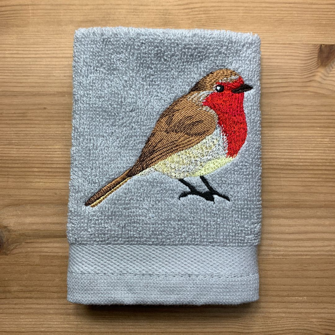 This gorgeous robin design is embroidered onto super soft cotton face cloths, by Coralie's Crafts & Gifts in Dorset