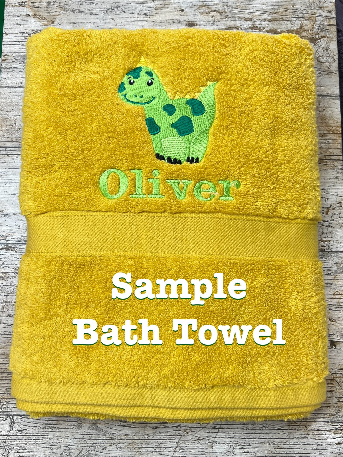 This Bath towel sample shows where the placement of the design and name are placed & embroidered. 