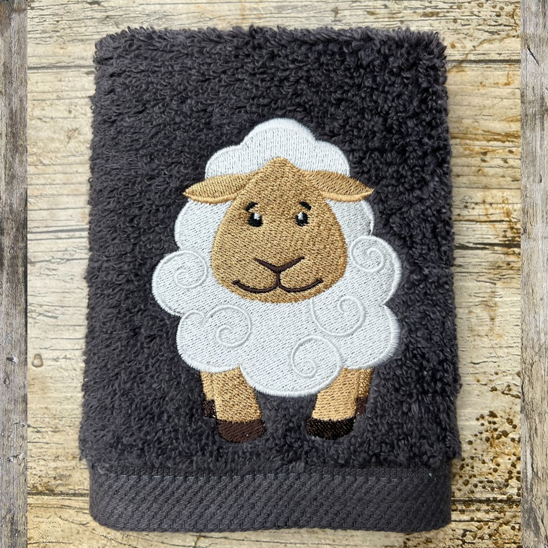 This cute sheep design is embroidered onto super soft face cloths by Coralie's Crafts & Gifts