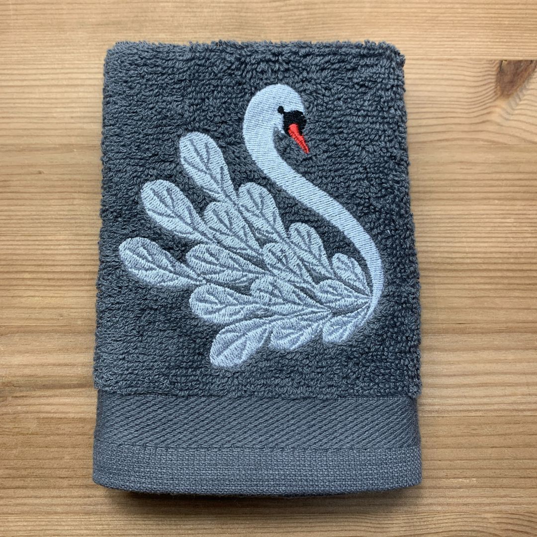 Elegant Swan design is embroidered onto super soft face cloths by Coralie's Crafts & Gifts to order at our shop in Dorset.