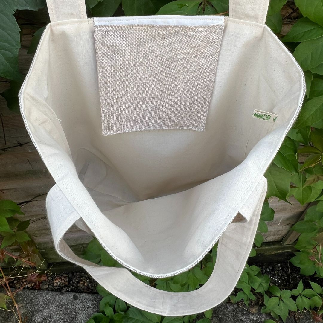 The inside of the bag is fully lined and squared off at the bottom, there is also a pocket at the top of the bag which is ideal for keeping your keys in.