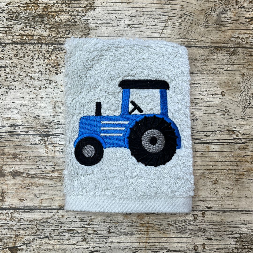 Great Tractor design, perfect for any tractor fans big or small, embroidered onto super soft face cloths, the main colour of the tractor can be different colours.