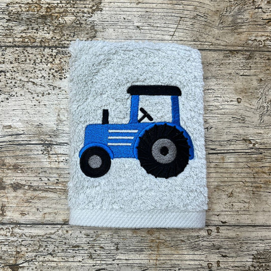 Great Tractor design, perfect for any tractor fans big or small, embroidered onto super soft face cloths, the main colour of the tractor can be different colours.