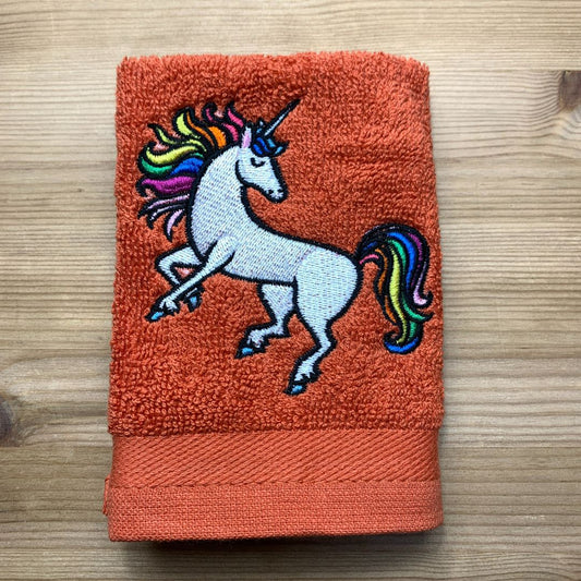 Beautiful unicorn design with fabulous rainbow mane, embroidered onto super soft face cloths to order, at Coralie's Crafts & Gifts. 
