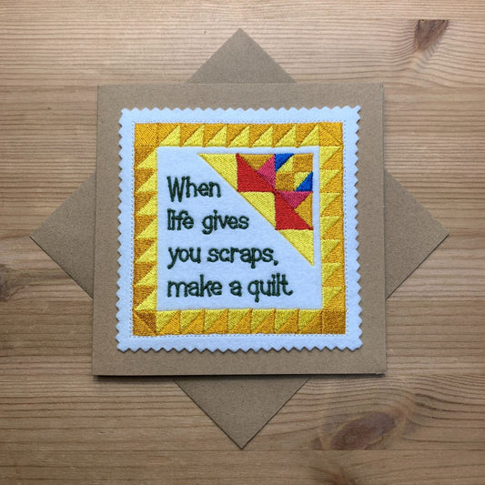 quilting quote is embroidered onto felt, cut out and put onto card.